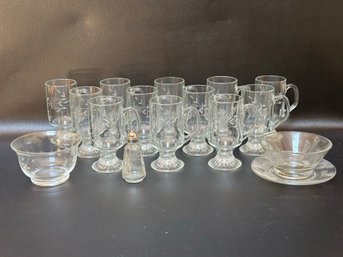 A Small Assortment Of Etched Glass By Princess House