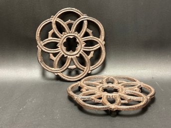 A Pair Of Vintage-Style Cast Iron Trivets