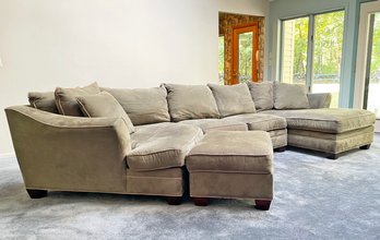 A Large And Comfortable Microfiber Sectional Sofa And Ottoman By HM Richard's