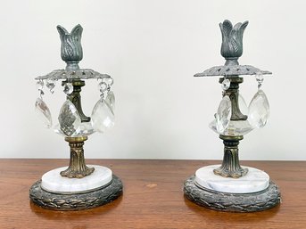 A Pair Of Antique Candlesticks With Marble Base Plates