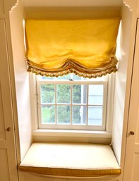 A Yellow Tasseled Custom Silk Balloon Shade With Bench Cushion