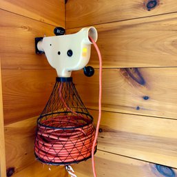 A Wonder Winder Extension Cord Caddy