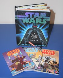 Three Star Wars Paperbacks And One Hard Cover 'pop - Up' Guide To The Galaxy, Clone Wars Adventures Vol. 1,5,8