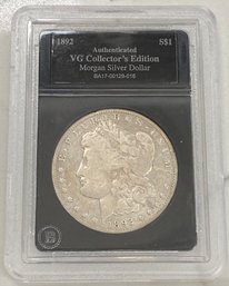 Authenticated VG Collector's Edition Morgan Silver Dollar 1892