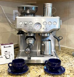 A Breville Espresso Machine And Accessories