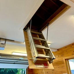 A Werner Aluminum Attic Stair Ladder