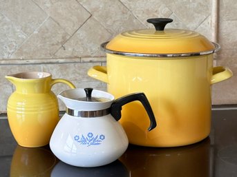 A Le Creuset Pitcher And Pasta Pot And Vintage Corning Ware Tea Pot