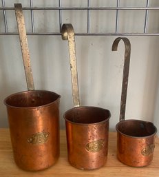 Three Vintage Copper Measuring Cups