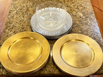 Gold And Silver Chargers And A Crystal Fruit Bowl