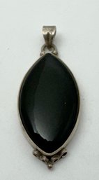 VINTAGE STERLING SILVER AND ONYX PENDANT
