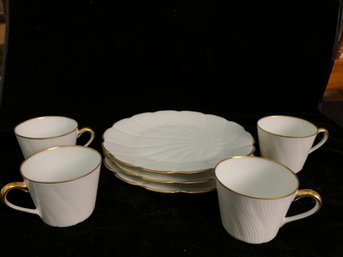 Gold Trimmed Tea Cup And Saucers