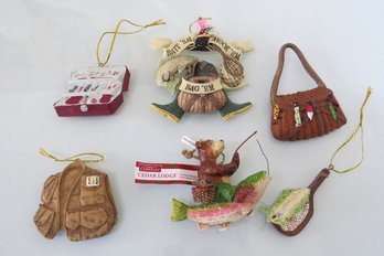 A Grouping Of Fishing Themed Tree Ornaments