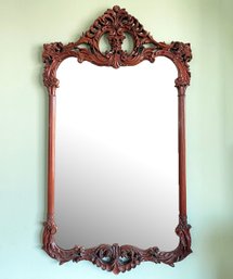 A Vintage Ornately Carved Mahogany Framed Mirror