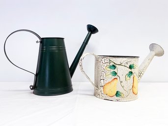 A Pair Of Metal Watering Cans