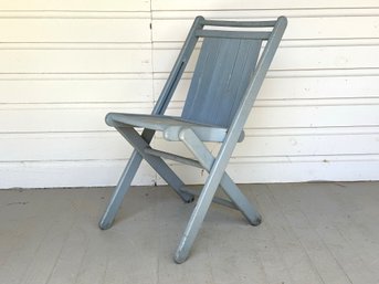 A Vintage Wood-Slat Folding Chair
