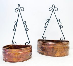 A Pair Of Large Copper Wall Mount Planters