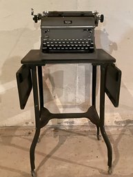 Vintage Royal Typewriter Machine With A Metal Table.