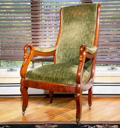 A Vintage Mahogany Arm Chair With Swam Form Carvings