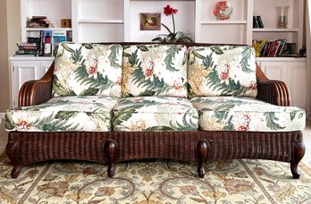A Vintage Seaside Rattan Sofa With Tropical Print Cushions From Mystic Wicker