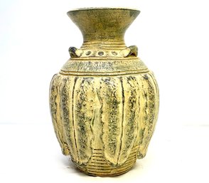 A Glazed Terra Cotta Vase