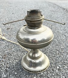 A Vintage Pewter Oil Lamp