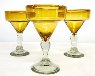 A Trio Of Hand Blown Margarita Glasses