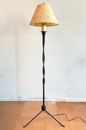 A Wrought Iron Lamp