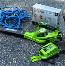 Garage Tools - A Battery Powered Blower, Garden Hose And More