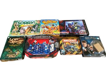 Awesome Lot Of Board Games Including Harry Potter, Wreckage, Laser Battle, Lost In A Jigsaw II, Buckaroo!