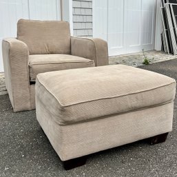 An Upholstered Arm Chair And Ottoman - By Beauty Rest