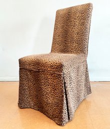 A Slip Covered Parsons Chair In Animal Print