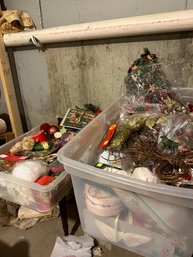 2 Huge Bins Of Christmas Decorations.  Everything From Ornaments To Tins, To Ribbon