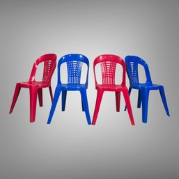 Set Of Four Plastic Syroco Primary Color Chairs