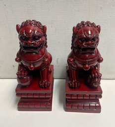 Mid Century Pr Of Chinese Foo Dogs . Blood Red In Color . Very Heavy .