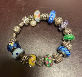 Authentic Pandora Bracelet . About 21 Charms