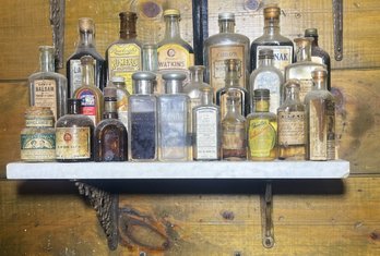 White Marble Slab Shelf W Black Brackets And Antique Bottles- Watkins, Rawleigh's, Paregoric, Stetson & More