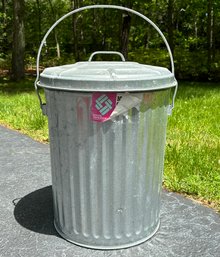 A Galvanized Steel Trash Can