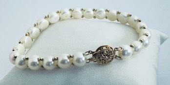 STUNNING 14K GOLD PEARL BRACELET 7' LONG