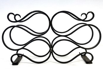 A Wrought Iron Wine Rack