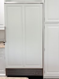 A Sub Zero Refrigerator With Wood Panel - 601R