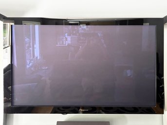 A 60 Inch Pioneer Flat Screen TV