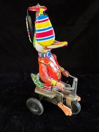 Vintage Mechanical Wind Up Circus Duck On Tricycle Tin Toy With Propeller Hat