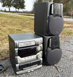 A Vintage JVC Boom Box With Detachable Speakers