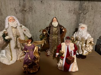 Four Santas And A Paper Mache Angel