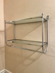 A Chrome And Glass 19' Wall Shelf With Towel Bar