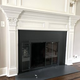 A Custom Carved Wood Mantel And Fireplace Surround - LR