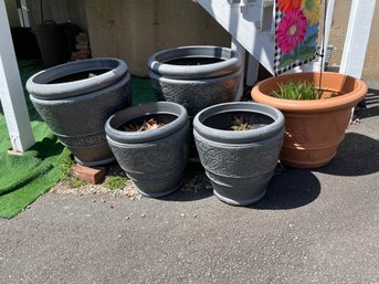 Five Larger Plastic Planters.