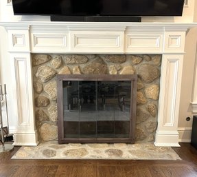 A Wood Fireplace Mantel And Surround- Family Room