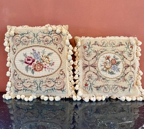 Two Vintage Needlepoint Throw Pillows With Floral Motif And Pom Pom Trim