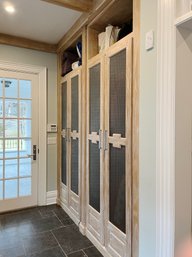 A Set Of Wood Cabinets With Nickel Wire Mesh - Mudroom